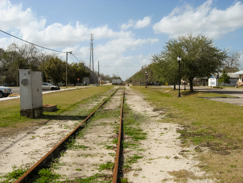 Photo Credit: David July — The old Savannah, Florida and Western Railroad tracks (1884) running northwest through High Springs at Main Street, High Springs, Florida: 19 February 2012