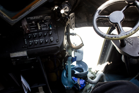 Photo Credit: David July — Oxygen regulator and radio controls, oxygen mask, lower window and tiller wheel from the captain's seat in the cockpit aboard United States Air Force Reserve 403d Wing 53d Weather Reconnaissance Squadron 'Hurricane Hunters' WC-130J Hercules 75304, Tallahassee, Florida: 22 May 2014