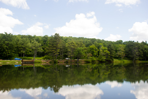 Photo Credit: David July — Looking across Science Lake at the fishing pier and ASP Route 3 from the far side of Science Lake Dam (1926) in Allegany State Park, Salamanca, New York: 27 June 2014