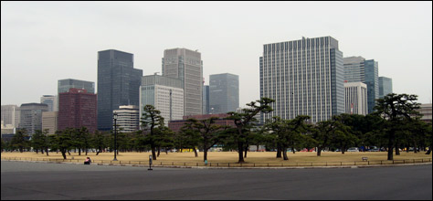 Photo Credit: David July — The Marunouchi skyscrapers beyond the Tokyo Imperial Palace grounds, Tokyo, Japan, 17 March 2008
