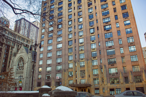 Photo Credit: David July — Holy Trinity Lutheran Church (1904) and 55 Central Park West (1929) from a pathway near West 66th Street at Central Park West, New York, New York, 24 January 2014