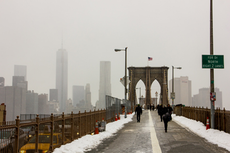 Photo Credit: David July — Walking toward the eastern tower of the Brooklyn Bridge (1883) on the pedestrian and cyclist promenade, Brooklyn, New York: 26 January 2014