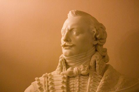 Photo Credit: David July — Marble bust of Casimir Pulaski (1857) by Henry Dmochowski Saunders in a portico outside the Old Supreme Court Chamber on 1F in the north wing of the United States Capitol (1811/1866), Washington, District of Columbia: 02 February 2014