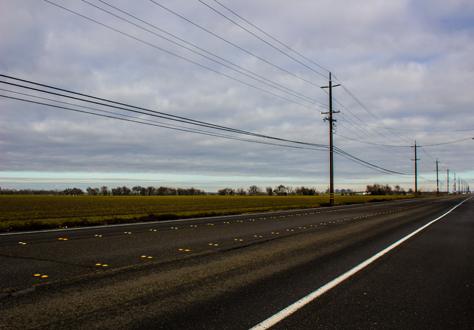 Photo Credit: David July — Looking north on the aptly named Pole Line Road as the skies over Davis begin to clear, Davis, California, 25 January 2013