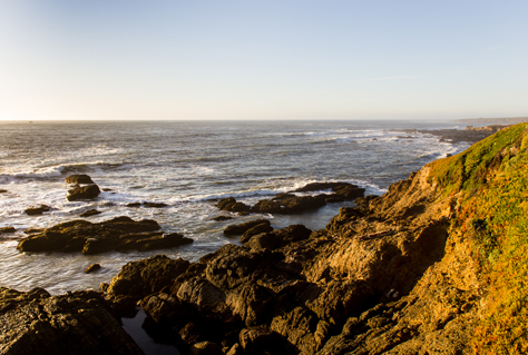 Photo Credit: David July — Looking north up the coastline from the platform on the edge of the rocky promontory upon which the Pigeon Point Lighthouse (1871) is built, Pescadero, California: 30 January 2013