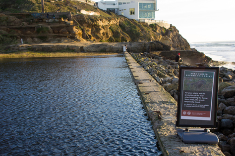 Photo Credit: David July — 'Area Closed Beyond This Point' sign on the western wall of Sutro Baths (1896) due to Sutro Sam the river otter's unusual visit, San Francisco, California, 21 January 2013