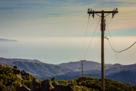 Photo Credit: David July — Power lines to the Mount Tamalpais East Peak fire lookout tower and the Pacific Ocean beyond from atop the 2,571 feet summit at the end of the Plank Walk Trail in Mount Tamalpais State Park, Marin County, California, 29 January 2013