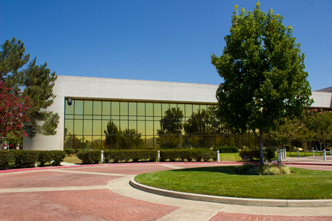 Photo Credit: David July — Southwestern driveway circle and corner of the front of 400 National Way (1984), the fictional PlayTronics headquarters building in 'Sneakers' (1992), Simi Valley, California: 22 August 2013