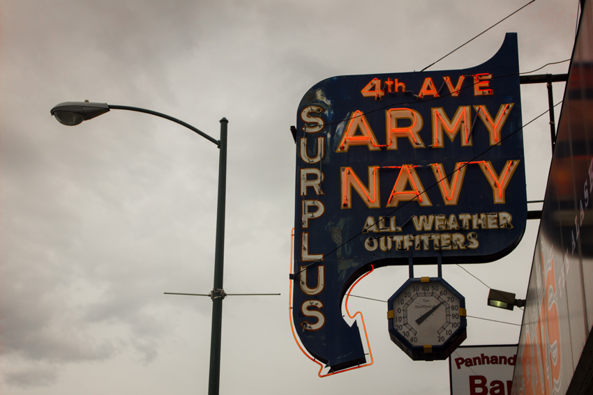 The neon sign for Big Ray's 4th Avenue Army Navy Surplus on a building (1957) in downtown Anchorage