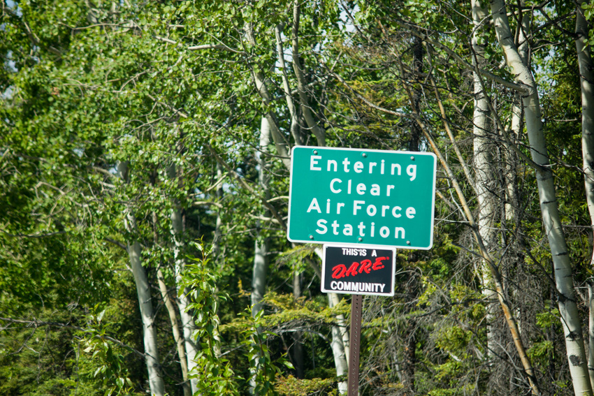 'Entering Clear Air Force Station' sign on the public road to the base