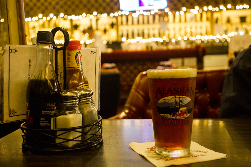 Cold pint of Alaskan Amber beer served to my table at Thorn's Showcase Lounge