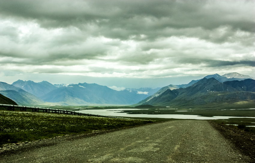 Alaska's Brooks Range, Galbraith Lake and the Trans-Alaska pipeline seen from mile marker 276 on the James W. Dalton Highway (North Slope Haul Road/SR 11) nearly a mile north of Galbraith Airport Road (by Carol Nichelson)