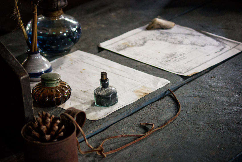 Writing instruments and a map of Florida on a desk inside the reproduction of a fort originally built here in December 1836 at what is now the Fort Foster State Historic Site at Hillsborough River State Park