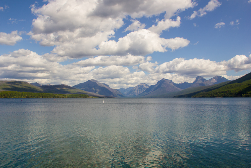 Lake McDonald, valley and mountains from the Apgar Village boat ramp dock in Glacier National Park.