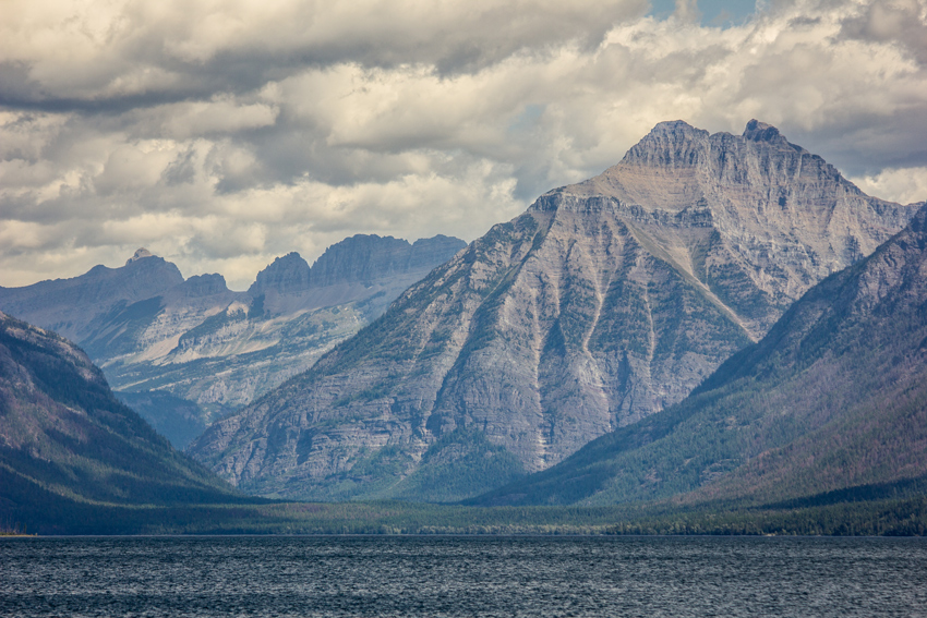 Lewis Range terrain including a section of the Garden Wall and Mount Cannon from the Apgar Village boat ramp dock on Lake McDonald in Glacier National Park.