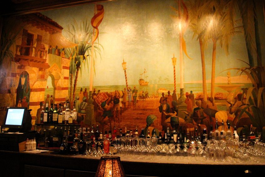 Mural of a Spanish waterfront scene by Robert von Ezdorf behind the bar inside the Iberian Lounge at The Hotel Hershey (1932) in Hershey, Pennsylvania