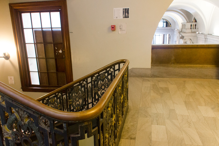 Lookout over the Great Hall at the southern stairway landing on the second level of the College of Fine Arts Building (1916) at Carnegie Mellon University