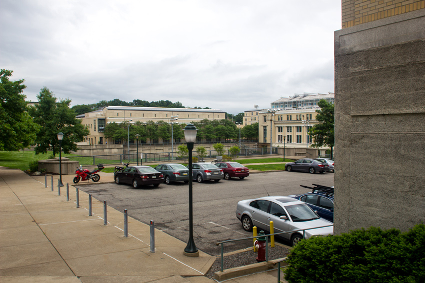 The Fine Arts Parking Lot (P8), Jared L. Cohon University Center (1996) and Margaret Morrison Carnegie Hall (1914) from outside the College of Fine Arts Building (1916) at Carnegie Mellon University