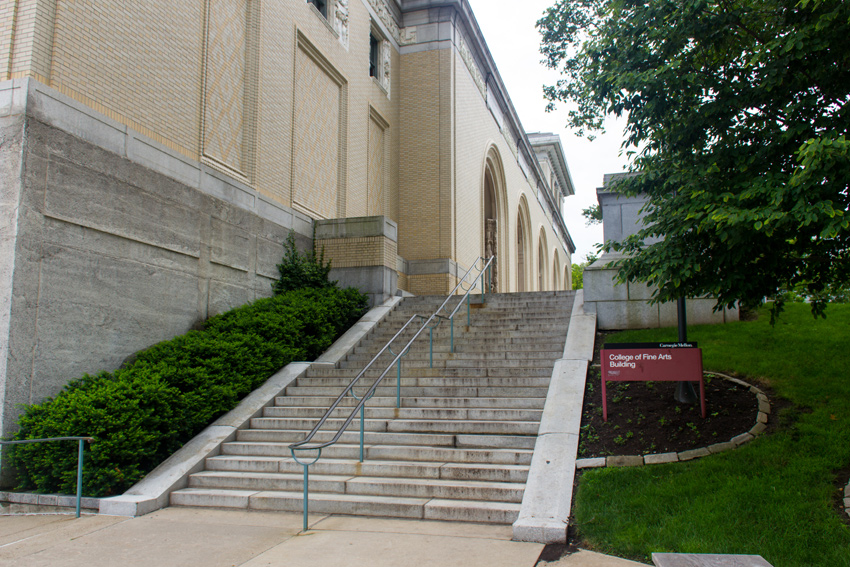 Stairs to the College of Fine Arts Building (1916) main entrance from the Fine Arts Parking Lot (P8) at Carnegie Mellon University