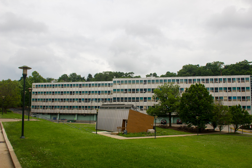 Donner House (1952–1954) and the Solar Decathlon House (2005) from the East-West Walkway near Gesling Stadium at Carnegie Mellon University
