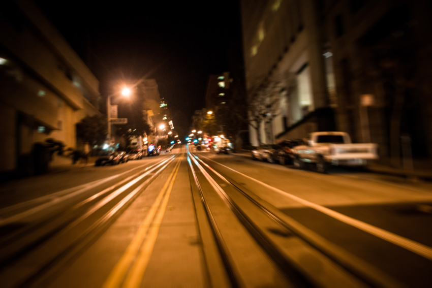 Cable car tracks going west on California Street toward Nob Hill from near the St. Mary's Square parking garage